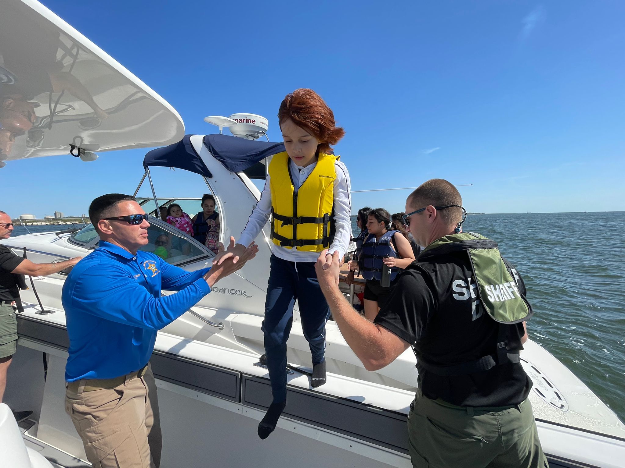 Sheriff Chad Chronister helps save 11 people from sinking boat