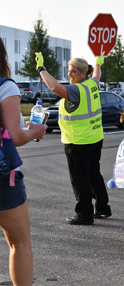 smiling school crossingguard