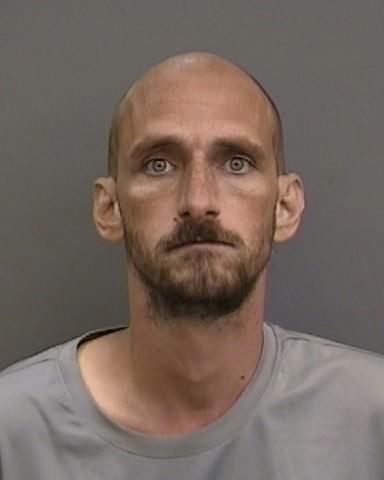 Shocking Video Shows Armed Suspect Holding Victim Hostage, Aiming Weapons at Officers