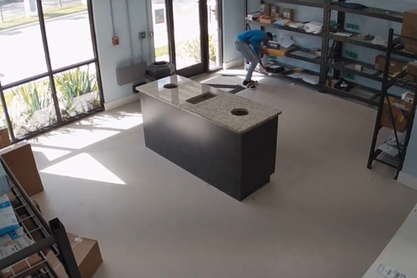VIDEO: Suspect caught "shopping" for packages in apartment mailroom